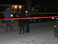 Chicago police officers are at the crime scene. A 38-year-old male victim is being shot multiple times while inside a vehicle and is being p...