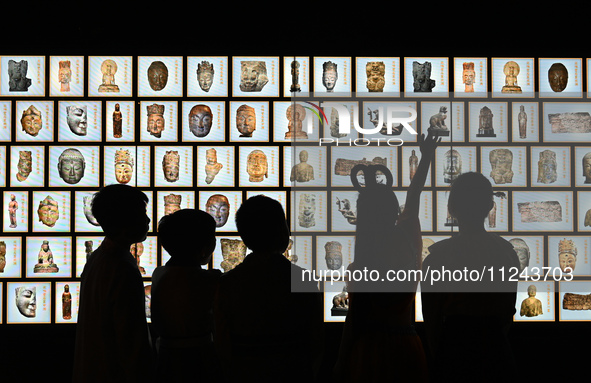 Primary school students are visiting Fengfeng Museum in Handan, China, on May 16, 2024. May 18 is International Museum Day. 