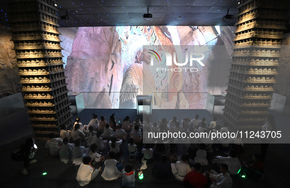 Primary school students are visiting Fengfeng Museum in Handan, China, on May 16, 2024. May 18 is International Museum Day. 