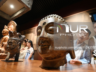 Primary school students are visiting Fengfeng Museum in Handan, China, on May 16, 2024. May 18 is International Museum Day. (