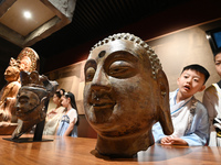 Primary school students are visiting Fengfeng Museum in Handan, China, on May 16, 2024. May 18 is International Museum Day. (