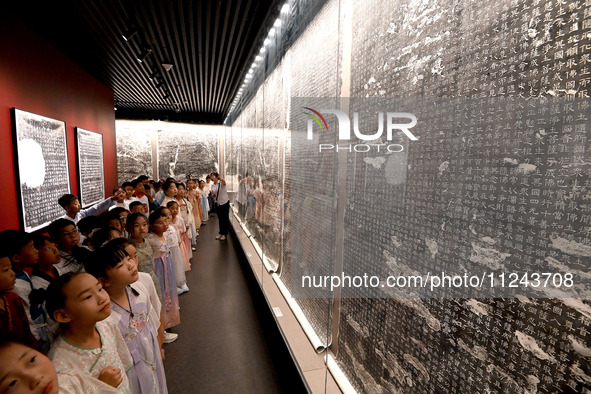 Primary school students are visiting Fengfeng Museum in Handan, China, on May 16, 2024. May 18 is International Museum Day. 