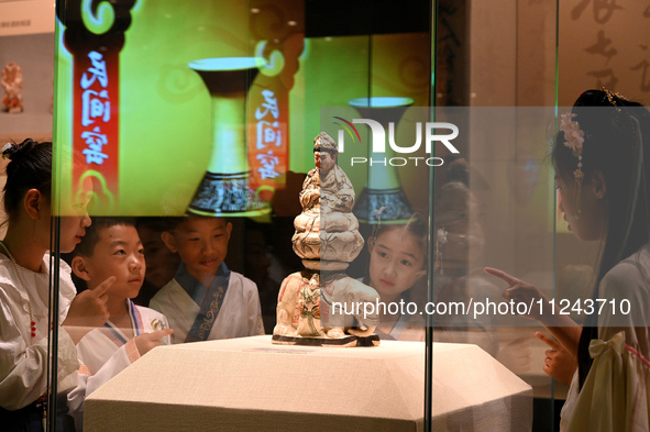 Primary school students are visiting Fengfeng Museum in Handan, China, on May 16, 2024. May 18 is International Museum Day. 