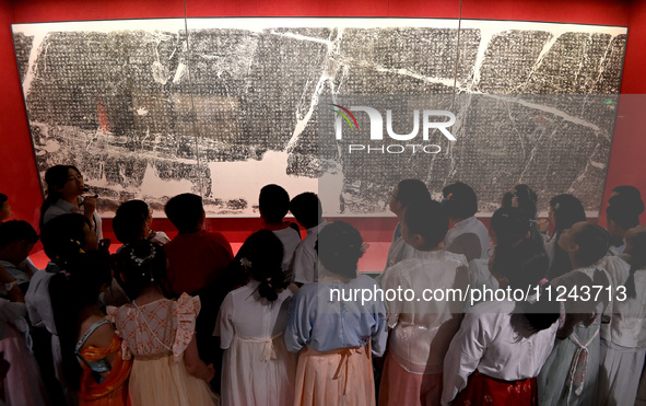 Primary school students are visiting Fengfeng Museum in Handan, China, on May 16, 2024. May 18 is International Museum Day. 