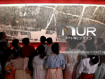 Primary school students are visiting Fengfeng Museum in Handan, China, on May 16, 2024. May 18 is International Museum Day. (