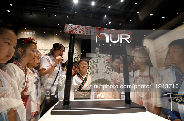 Primary school students are visiting Fengfeng Museum in Handan, China, on May 16, 2024. May 18 is International Museum Day. 