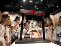 Primary school students are visiting Fengfeng Museum in Handan, China, on May 16, 2024. May 18 is International Museum Day. (