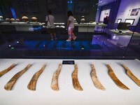 Visitors are looking at a cultural relics exhibition at Qingzhou Museum in East China's Shandong province, on May 16, 2024. (