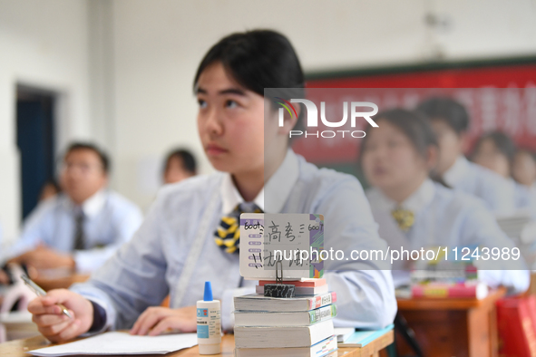 Senior three students are studying hard for the National college entrance examination in a class in Guiyang, China, on May 16, 2024. 