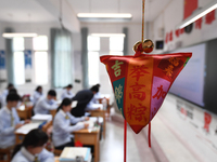 Senior three students are studying hard for the National college entrance examination in a class in Guiyang, China, on May 16, 2024. (