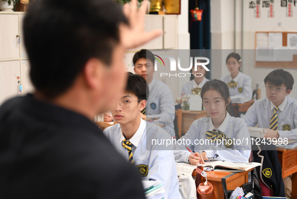 Senior three students are studying hard for the National college entrance examination in a class in Guiyang, China, on May 16, 2024. 