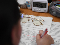 Senior three students are studying hard for the National college entrance examination in a class in Guiyang, China, on May 16, 2024. (