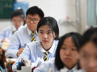 Senior three students are studying hard for the National college entrance examination in a class in Guiyang, China, on May 16, 2024. (