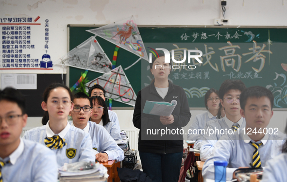 Senior three students are studying hard for the National college entrance examination in a class in Guiyang, China, on May 16, 2024. 