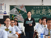 Senior three students are studying hard for the National college entrance examination in a class in Guiyang, China, on May 16, 2024. (