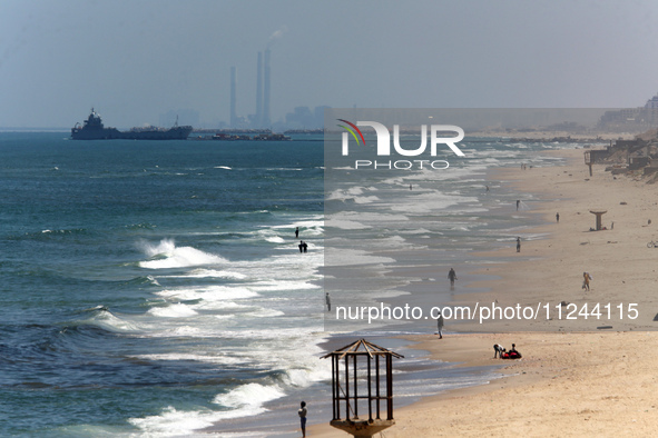 This picture is showing a view of a military ship in the Mediterranean Sea off the coast of the Gaza Strip on May 16, 2024. 