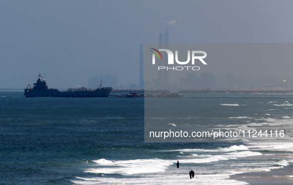 This picture is showing a view of a military ship in the Mediterranean Sea off the coast of the Gaza Strip on May 16, 2024. 