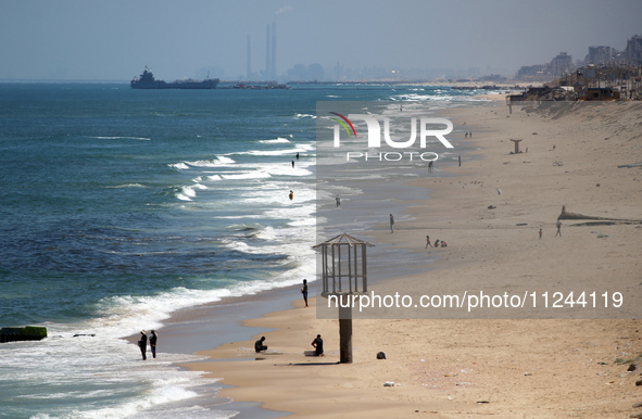 This picture is showing a view of a military ship in the Mediterranean Sea off the coast of the Gaza Strip on May 16, 2024. 