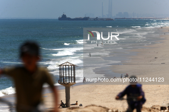 This picture is showing a view of a military ship in the Mediterranean Sea off the coast of the Gaza Strip on May 16, 2024. 