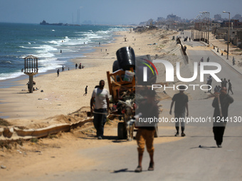 This picture is showing a view of a military ship in the Mediterranean Sea off the coast of the Gaza Strip on May 16, 2024. (