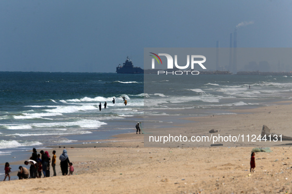 This picture is showing a view of a military ship in the Mediterranean Sea off the coast of the Gaza Strip on May 16, 2024. 