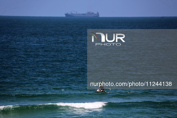 This picture is showing a view of a military ship in the Mediterranean Sea off the coast of the Gaza Strip on May 16, 2024. 