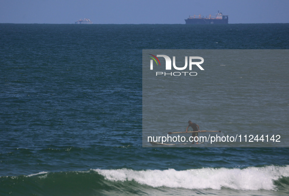 This picture is showing a view of a cargo freight ship in the Mediterranean Sea off the coast of the Gaza Strip, on May 16, 2024. 