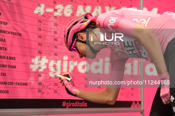 Tadej Pogacar of Slovenia and UAE Team Emirates - Pink Leader Jersey signing prior to the 107th Giro d'Italia 2024, Stage 12, a 193km stage...