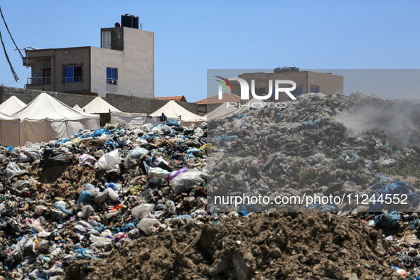 A view is showing piles of garbage amid the ongoing conflict in Gaza between Israel and Hamas, in Deir Al-Balah, in the central Gaza Strip,...