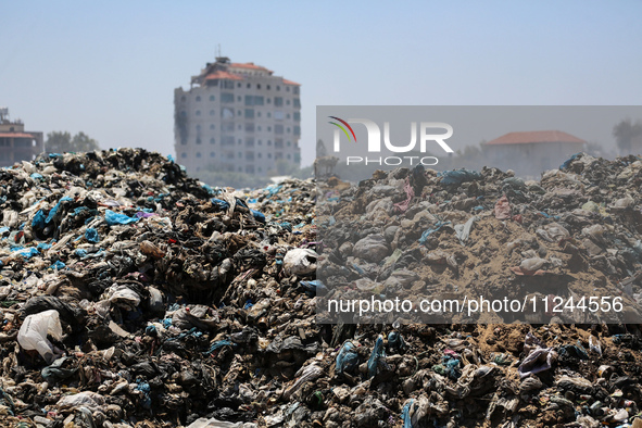 A view is showing piles of garbage amid the ongoing conflict in Gaza between Israel and Hamas, in Deir Al-Balah, in the central Gaza Strip,...