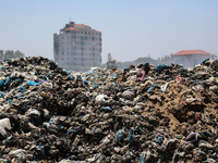 A view is showing piles of garbage amid the ongoing conflict in Gaza between Israel and Hamas, in Deir Al-Balah, in the central Gaza Strip,...