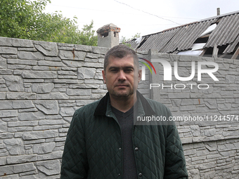 A man is being affected by the falling debris of a Russian rocket in Dnipro, Ukraine, on May 15, 2024. NO USE RUSSIA. NO USE BELARUS. (