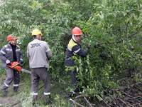 Electricians are dealing with damage caused by the falling debris of a Russian rocket in Dnipro, Ukraine, on May 15, 2024. NO USE RUSSIA. NO...