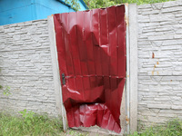 A fence is being damaged by the falling debris of a Russian rocket in Dnipro, Ukraine, on May 15, 2024. NO USE RUSSIA. NO USE BELARUS. (