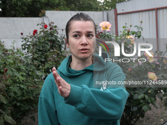 Maryna is owning a house damaged by the falling debris of a Russian rocket in Dnipro, Ukraine, on May 15, 2024. NO USE RUSSIA. NO USE BELARU...