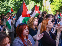 Students and activists attend solidarity with Palestine demonstration in front of Jagiellonian University building in Krakow, Poland on May...