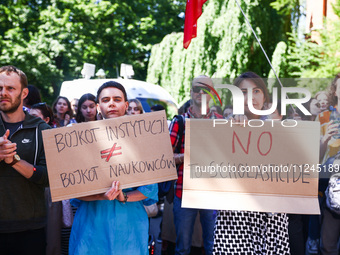 Students and activists attend solidarity with Palestine demonstration in front of Jagiellonian University building in Krakow, Poland on May...