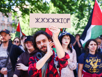 Students and activists attend solidarity with Palestine demonstration in front of Jagiellonian University building in Krakow, Poland on May...