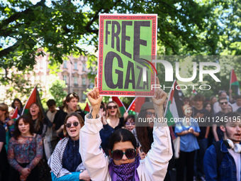 Students and activists attend solidarity with Palestine demonstration in front of Jagiellonian University building in Krakow, Poland on May...