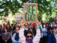 Students and activists attend solidarity with Palestine demonstration in front of Jagiellonian University building in Krakow, Poland on May...