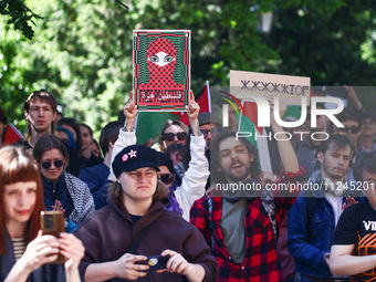 Students and activists attend solidarity with Palestine demonstration in front of Jagiellonian University building in Krakow, Poland on May...