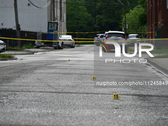 Shell casings are being found at the crime scene. A 26-year-old male victim is being injured in a shooting in Chicago, Illinois, United Stat...