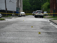 Shell casings are being found at the crime scene. A 26-year-old male victim is being injured in a shooting in Chicago, Illinois, United Stat...