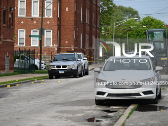 Shell casings are being found at the crime scene. A 26-year-old male victim is being injured in a shooting in Chicago, Illinois, United Stat...