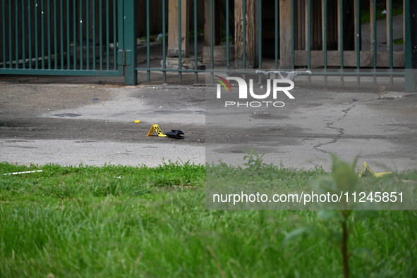 A holster is being discovered at the crime scene. A 26-year-old male victim is being injured in a shooting in Chicago, Illinois, United Stat...