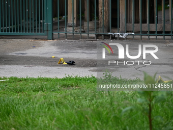 A holster is being discovered at the crime scene. A 26-year-old male victim is being injured in a shooting in Chicago, Illinois, United Stat...