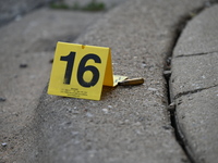 A shell casing is being discovered at the crime scene, tagged with an evidence marker. A 26-year-old male victim is being injured in a shoot...