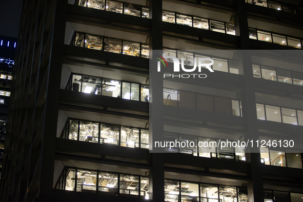 Many windows are being blown out of an office building at 1001 Louisiana Street in Houston, Texas, on May 16, 2024. 