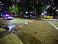 Streets are being blocked off by police as the cleanup crew is managing the aftermath of the storm in City, Country, on May 16, 2024. (