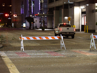 Shattered glass is covering the roads of downtown Houston, Texas, on May 16, 2024. (